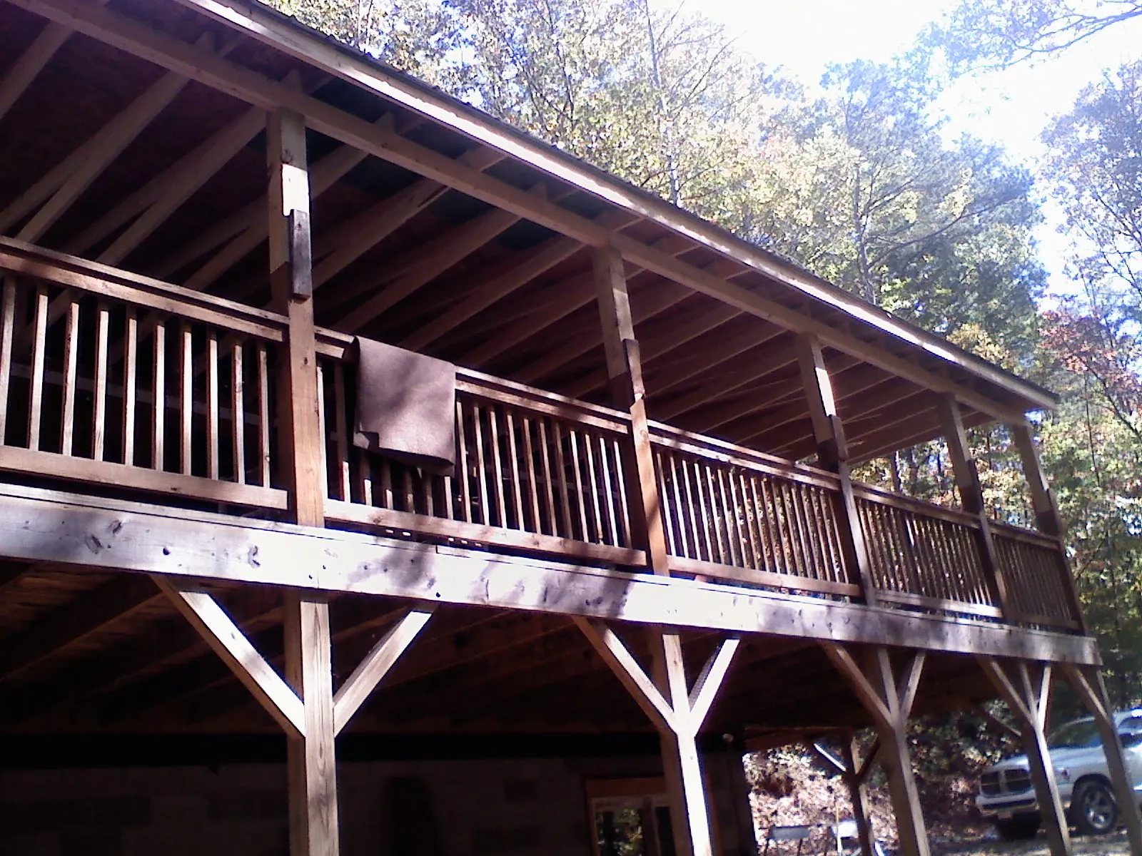 Timber framing under a new elevated porch and deck — Roof Leak Repair in Sciota by Roofing Brothers